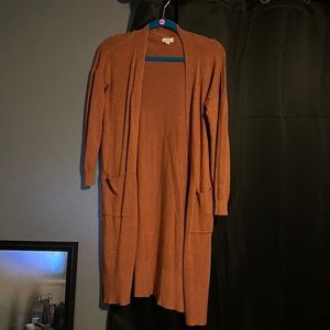 Burnt orange cardigan. Size small